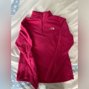 Bright pink North Face fleece pullover